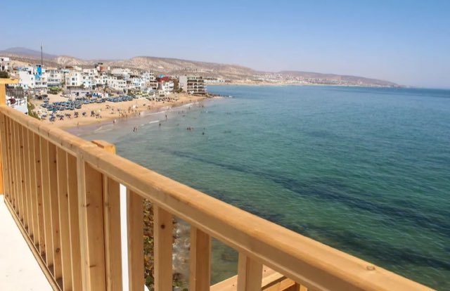 Beachfront apartment balcony over the bay