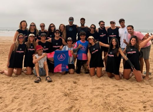 The AP Surftrips crew and students together on the beach