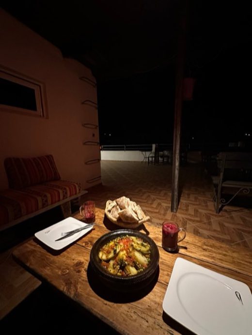 Vegetable tajine and bread on the villa terrace